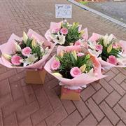Lily and gerbera handtied